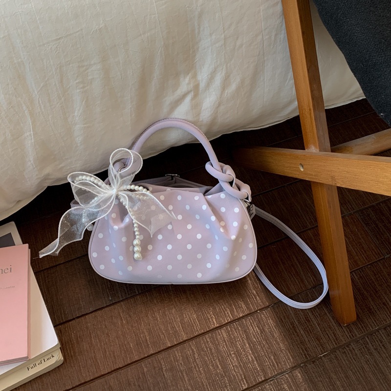 2026 primavera nuevo bolso de mano simple de alto valor, bolso de bolso pequeño, bolso de almohada de nicho diario, bolso de hombro