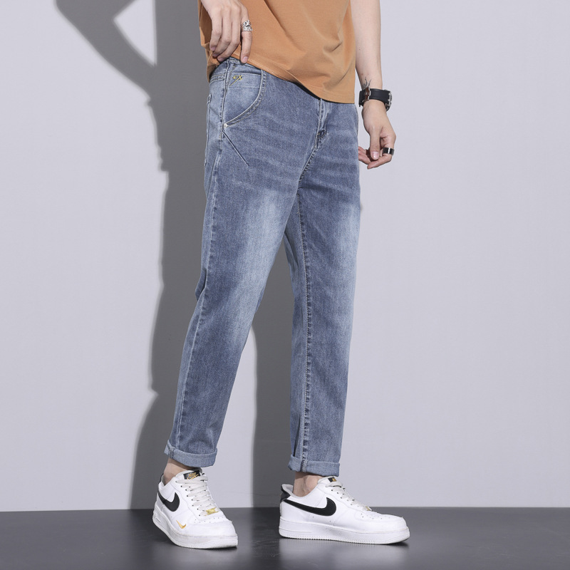 Pantalones rectos de los Hombres estilo americano adelgazamiento Cuatro Estaciones Nuevos pantalones casuales marca de moda en stock hombres sueltos pantalones vaqueros blancos