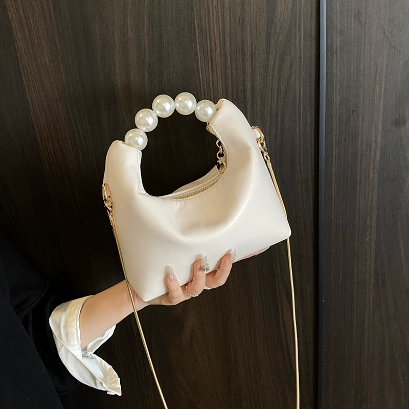 Внешняя торговля женская сумка 2025 новый нишевый дизайн простая жемчужная сумка через плечо с цепочкой маленькая свежая сумка для пельменей