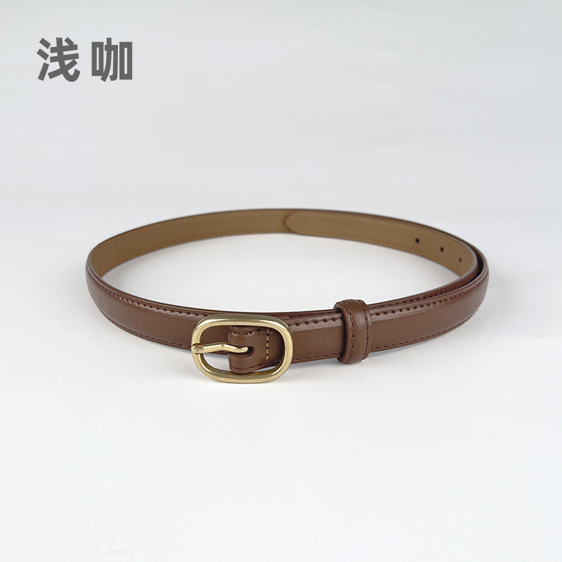 Correa delgada de cuero de las mujeres pantalones casuales pantalones vaqueros estilo coreano de moda todo partido simple de cuero de vaca cinturón de las mujeres