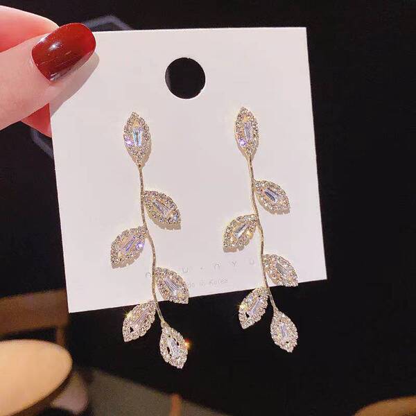 Long universal sophisticated earrings with zircon with tassels