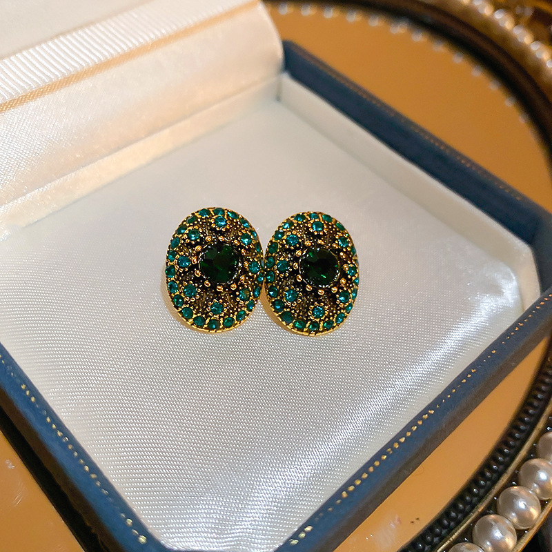 Temperamento de pendientes verdes pendientes ligeros lujosos de alto nivel sensación de pendientes zircon flores joyas geométricas al por mayor fábrica