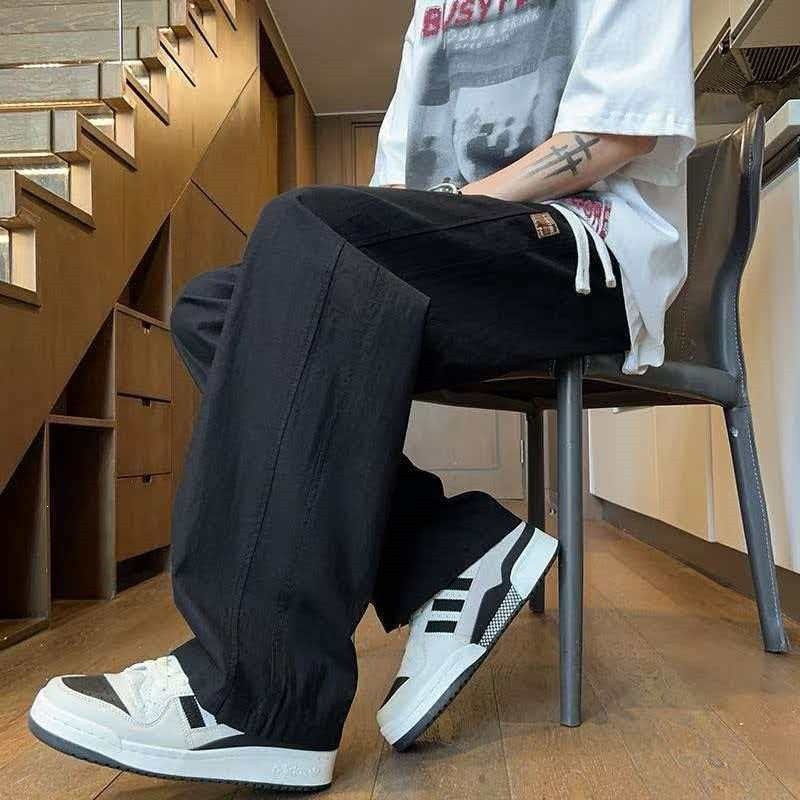 Fabricantes transfronterizos de pantalones casuales para hombres pantalones deportivos sueltos para hombres pantalones rectos delgados de verano para hombres comercio exterior