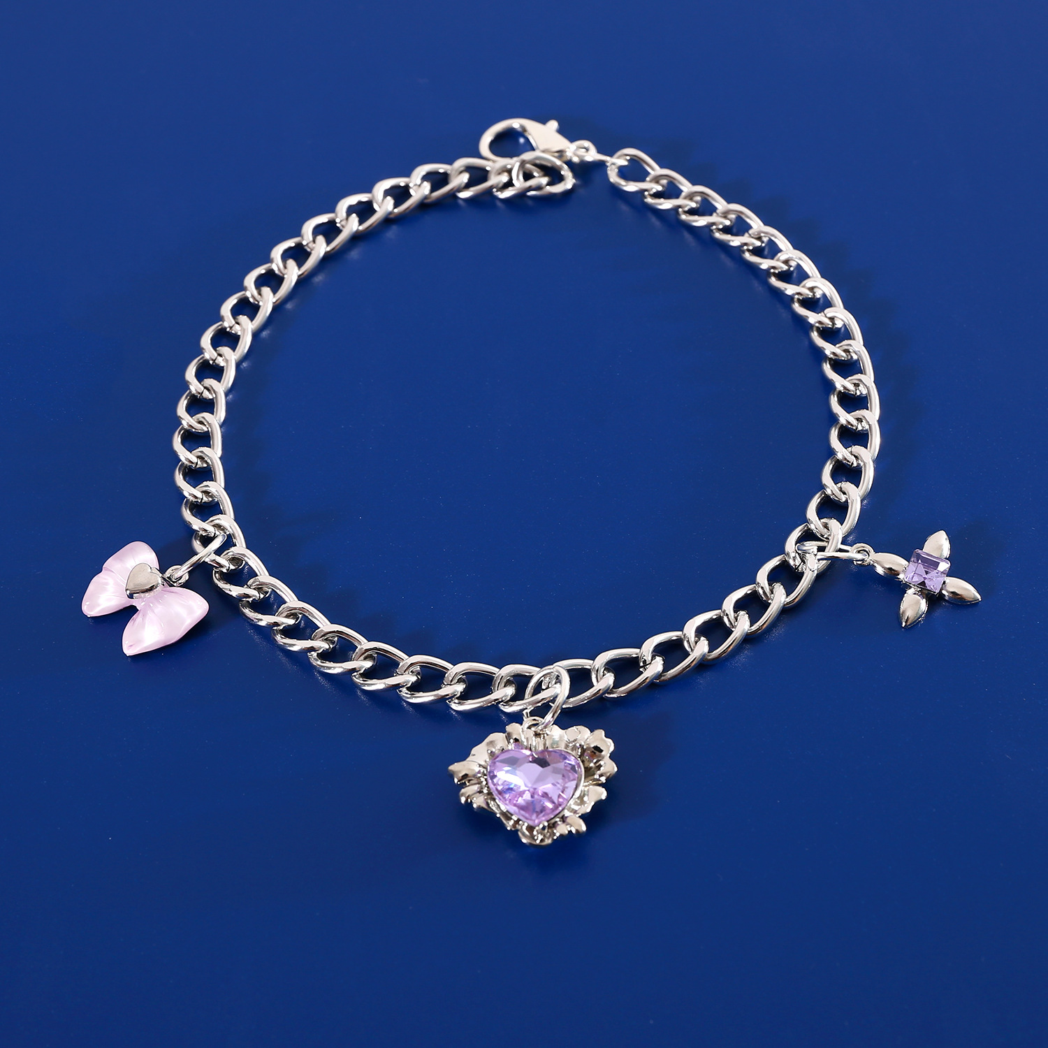 Comercio exterior mascotas collar de metal gemas amor arco colgante de zircon viento dulce gato perro collar de plata