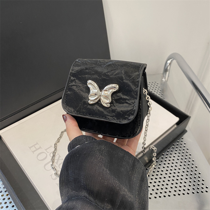 Mariposa de personalidad estética francesa 2024 otoño nuevo color sólido casual moda cadena mensajero hombro pequeño bolso cuadrado mujer