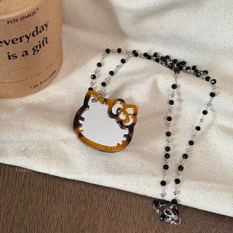 Leopard print hello kitty necklace