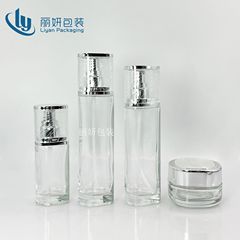 広州スキンケアガラスセット包装材100ml三角ガラス瓶精油瓶50gガラスクリーム瓶卸売り