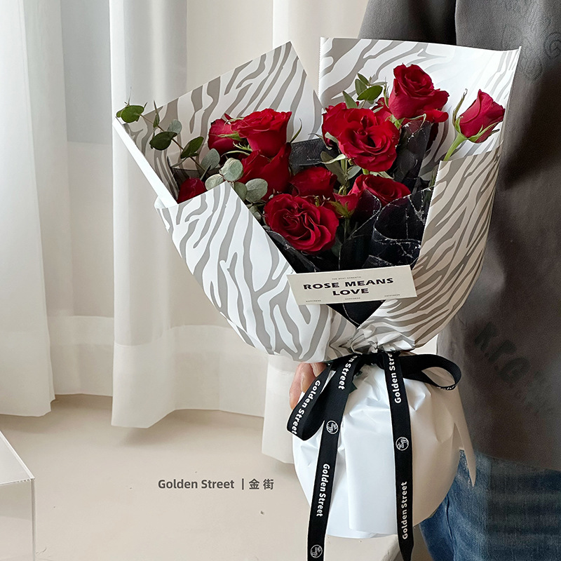 Huaxi Yuyin serie zebra flor de papel de embalaje comercio exterior transfronterizo al por mayor florista de material de ramo de flores
