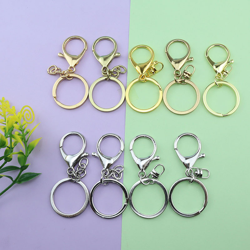 Spot wholesale zinc alloy high quality keychain three piece set kc Gold Key Ring 8 word lobster buckle set
