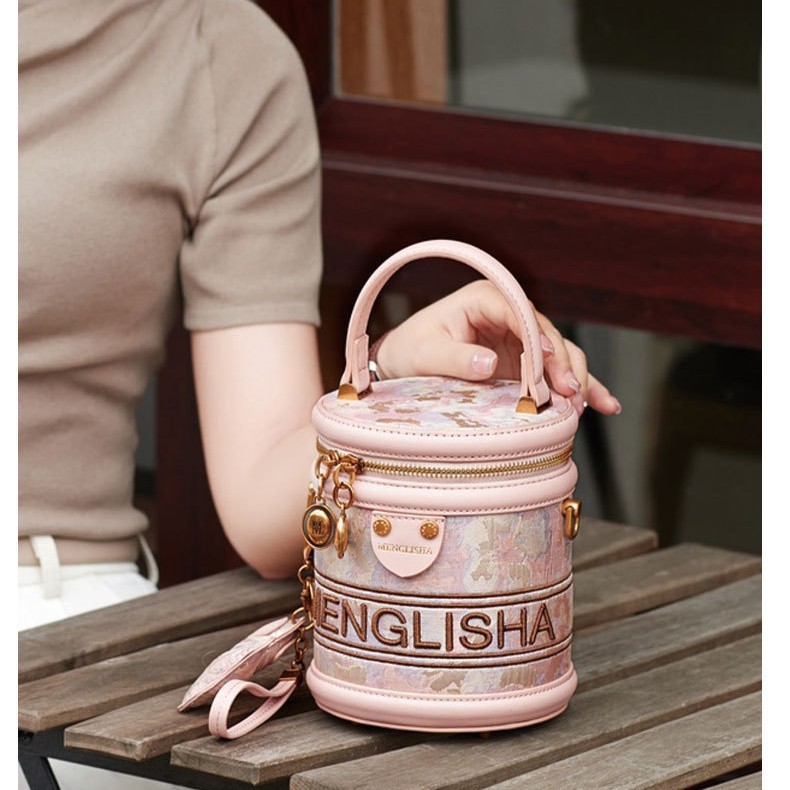 2025 nuevo bolso de cubo bordado de lujo ligero bolso de hombro portátil de viaje de todo fósforo para mujer bolso de mensajero portátil de gran capacidad