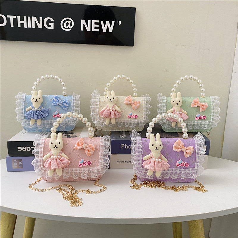 2025 nuevo pequeño viento de fragancia bolsos infantiles mil pájaros pequeños conejos de flores princesa mochila perlas bolsos de moda
