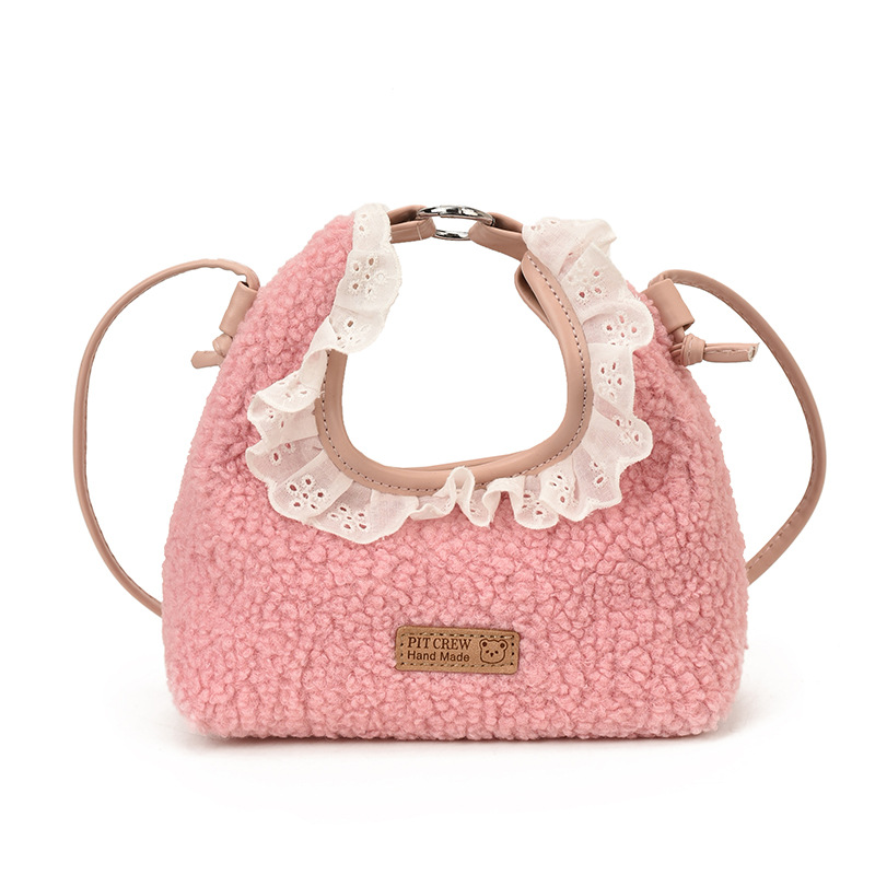 Bolsos para niños nuevos bolsos de encaje de color sólido extranjero nicho de diseño para padres e hijos cambio bolsos de mochila