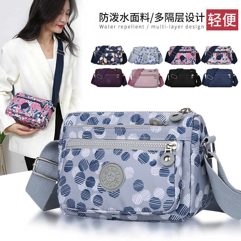 斜挎包女包百搭防水包單肩布包女士跨包老年包女斜跨牛津布包