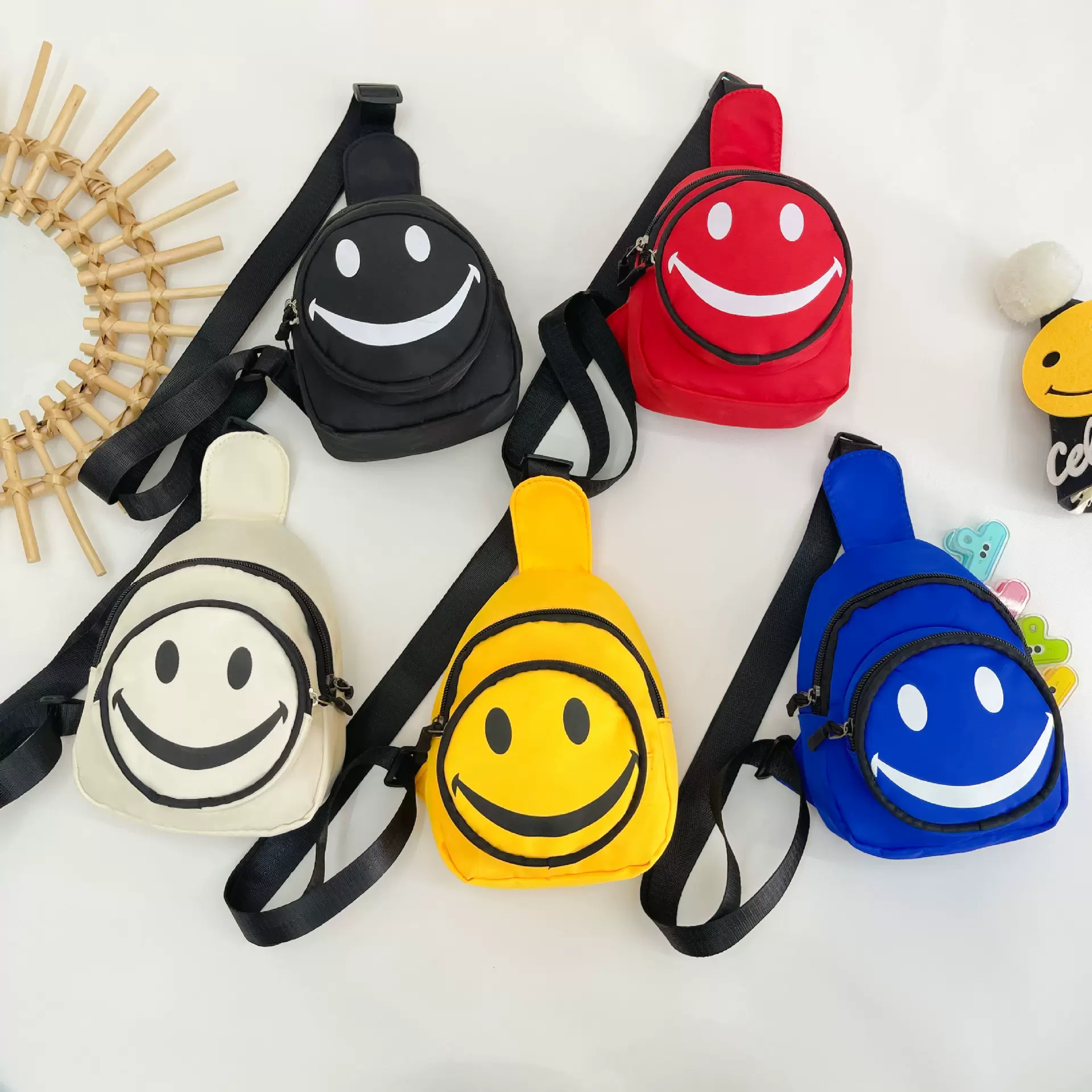 韩版儿童包2020秋季新款单肩包可爱笑脸小腰包潮男女童迷你斜挎包