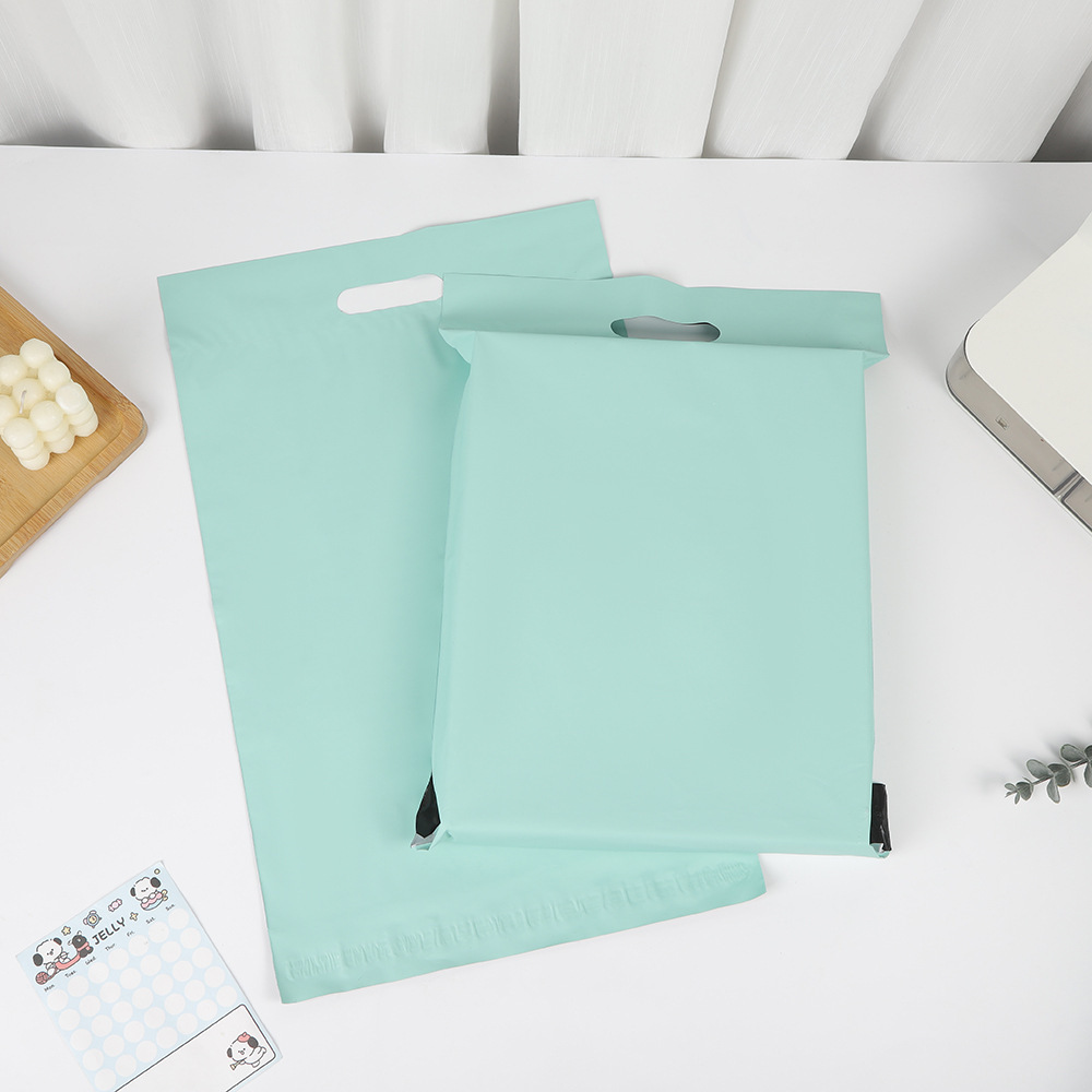 Bolsa de entrega rosa portátil, bolsa de embalaje de color de ropa PE gruesa, bolsa de transporte ecológico de gran capacidad, bolsa impermeable