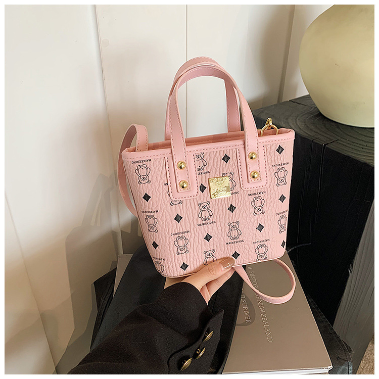 Bolso de cubo portátil 2024 Bolso popular de estilo caliente de este año para mujer, otoño e invierno, nuevo bolso de mensajero de moda para mujer