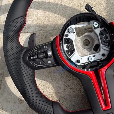 steering wheel with red: Steering wheel