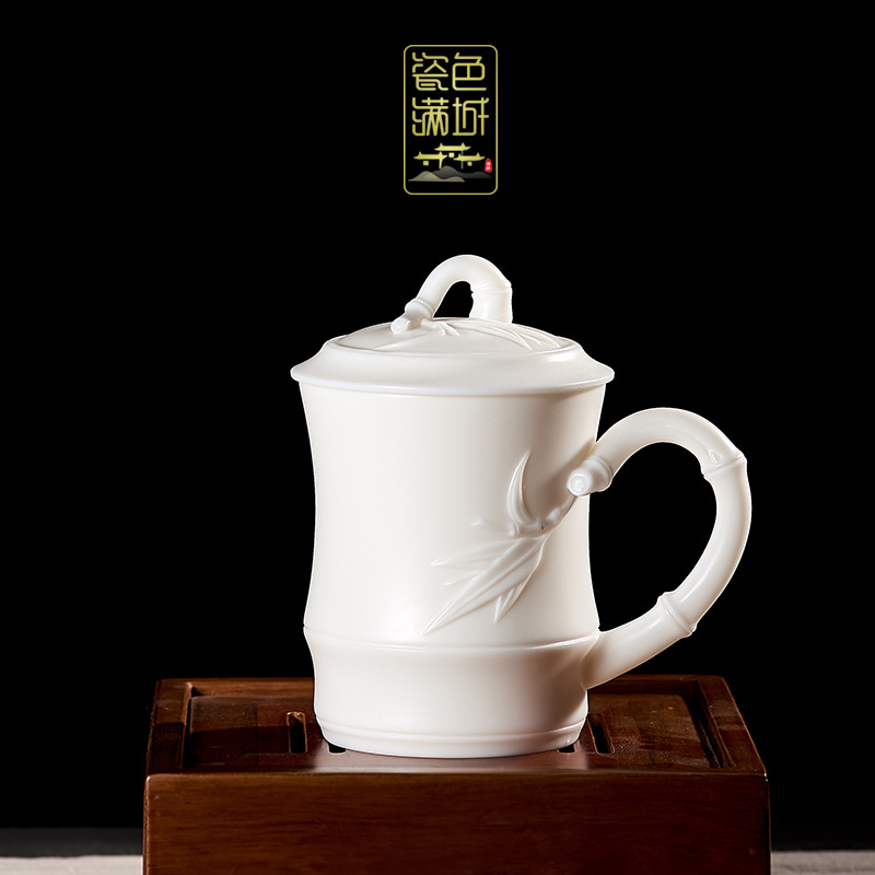 Porcelana color Mancheng Dehua porcelana blanca con tapa filtro oficina con revestimiento de separación taza de agua taza de té grande de cerámica personal
