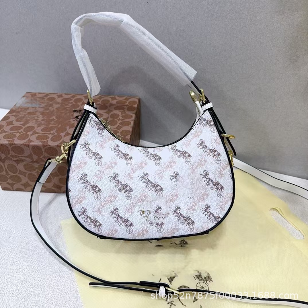 2023新型潮クロスボーダー対外貿易女性バッグ腋の下三日月包復古老花手提げシングル肩斜めショルダーバッグロゴ付き