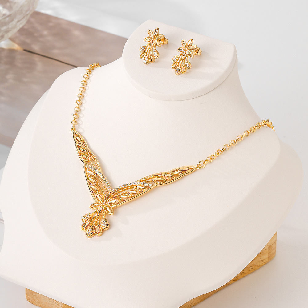 El estilo popular del Oriente Medio opciones transfronterizas de cobre y aluminio pendientes de piedra collar conjunto de joyas de mujer pernos de dos piezas conjunto de joyas