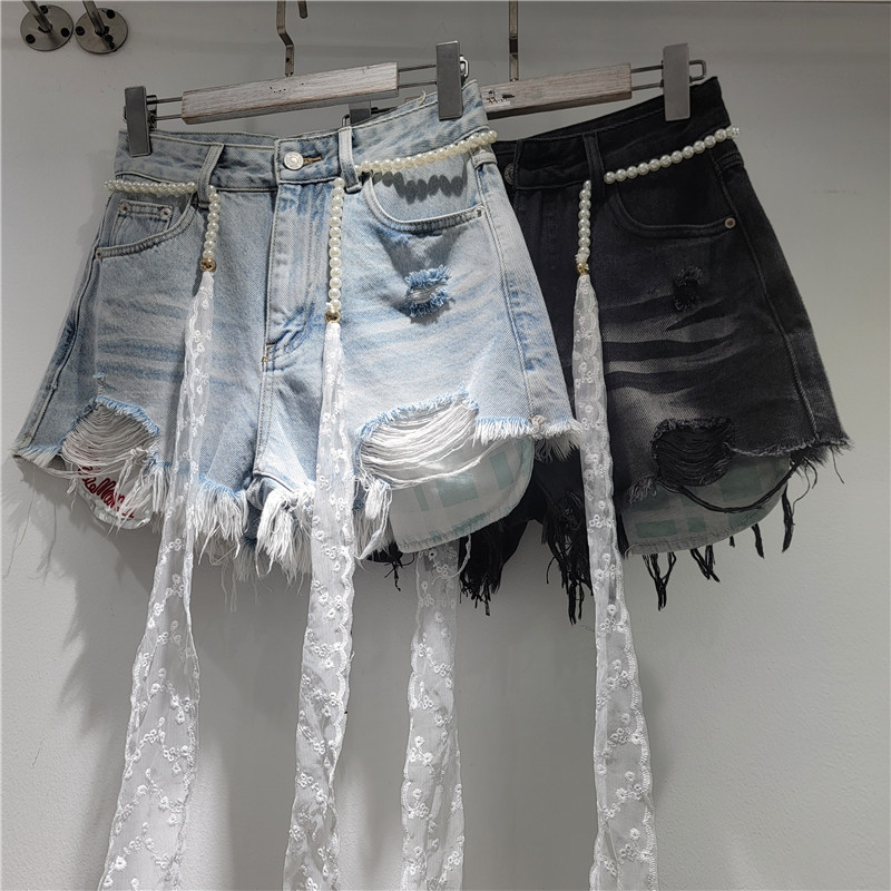 Shorts de Mezclilla con Desgastados y Bolsillos para Mujer image 1