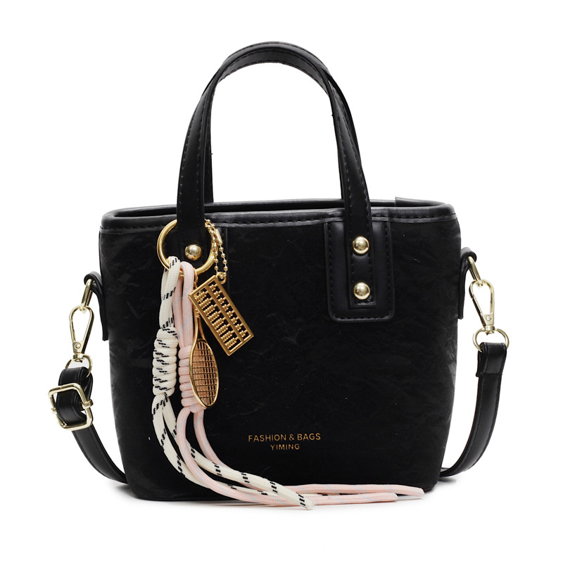 Comercio exterior explosión bolso de cubo de mano mujer 2025 nuevo simple bolso de hombro casual red explosión bolso de mochila coreano