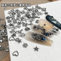 ネットの赤い新型のレトロなクロの心の装飾品のパンクの風のクロスクロスの銀の暗い系の金属の爪は装飾品の卸売りを配合します。