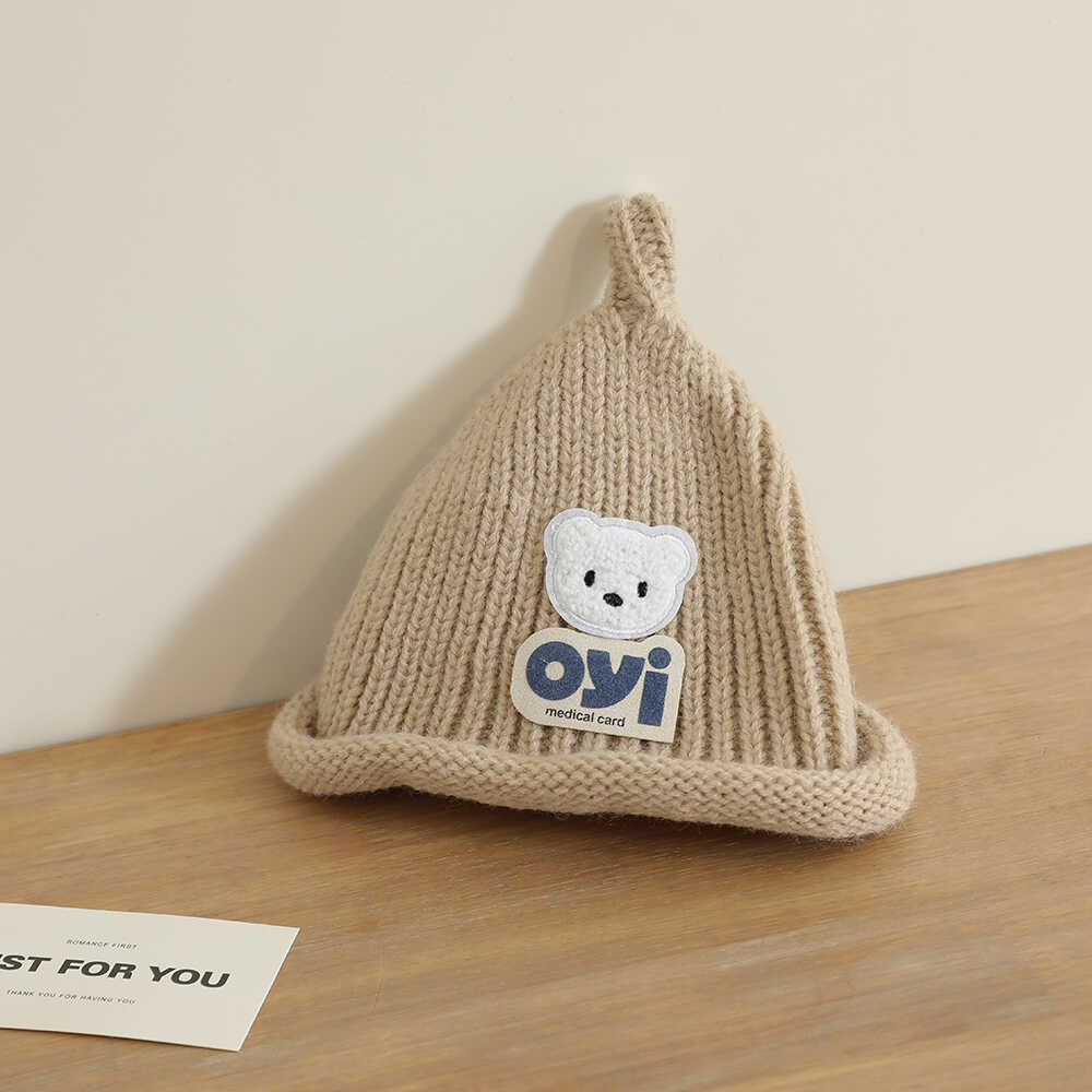 2024 otoño y invierno nuevo unisex lindo sombrero de punto de cabeza de oso simple sombrero de lana casual universal