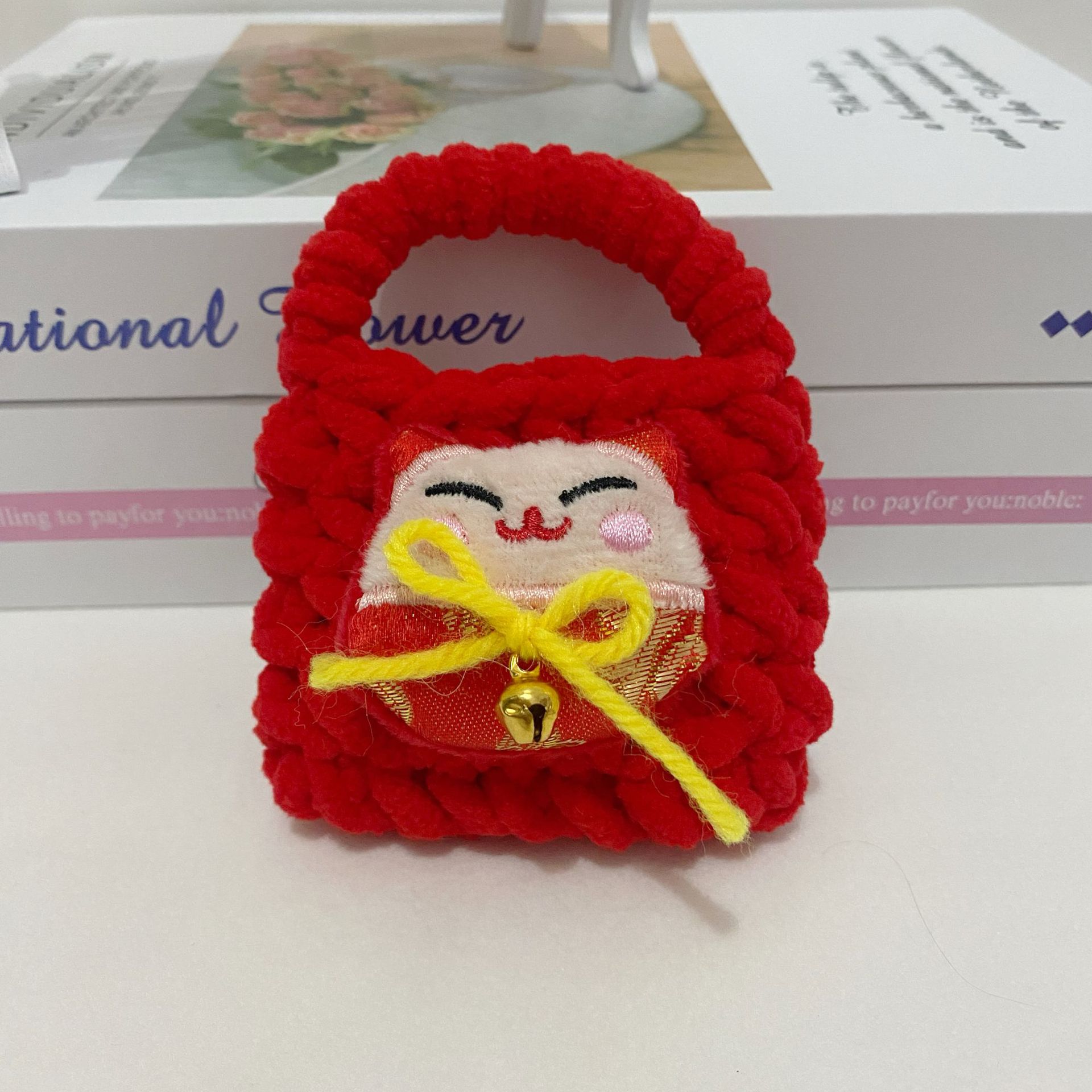 Celebración de Año Nuevo gran león rojo despertar dragón muñeca de peluche dibujos animados tejido a mano bolsas de auriculares Bluetooth bolsas de cambio al por mayor