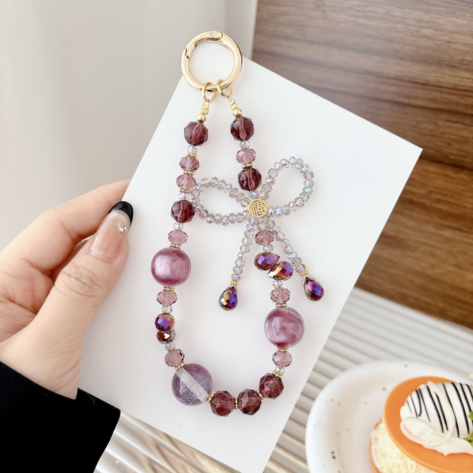 El arco de lujo ligero de lujo de alto nivel puede luchar, cadena de teléfono móvil, colgante de teléfono móvil, bolso, llavero, colgante, nicho de diseño