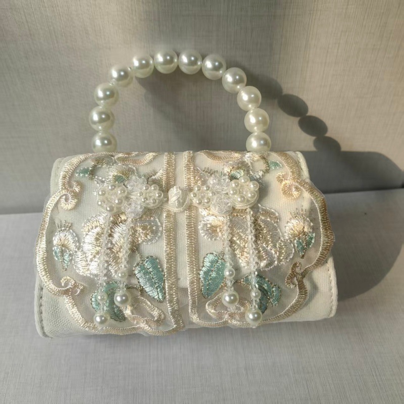 2025 primavera y verano estilo caliente moda casual niños dulces bolsa de gelatina mini bolso de mensajero de un solo hombro variedad al por mayor