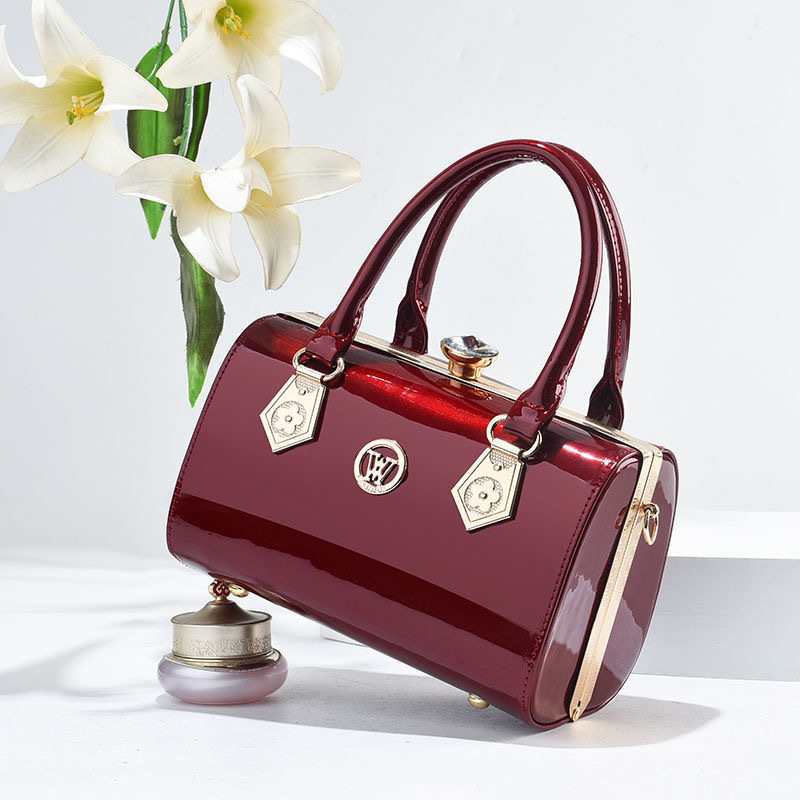 Bolso de mujer nuevo bolso de mujer de estilo europeo y americano de moda abrazadera de acero de cuero brillante bolso de brazo oblicuo bolso de textura de hombro de mujer