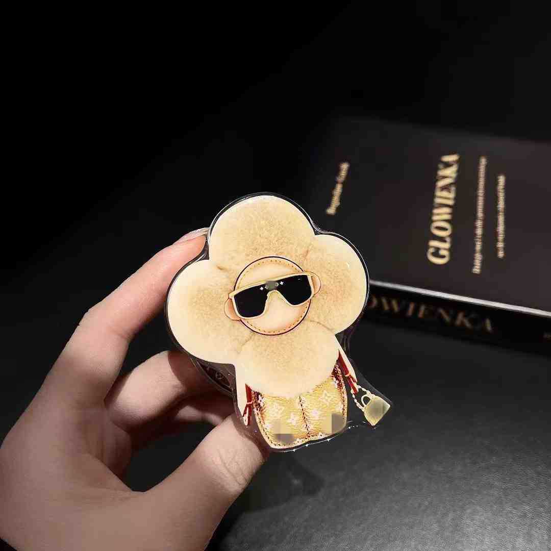 新型高級マグネットスタンドマグネット式携帯ケース通用太陽花マグネット式エアバッグスタンドはおしゃれで豪華です。