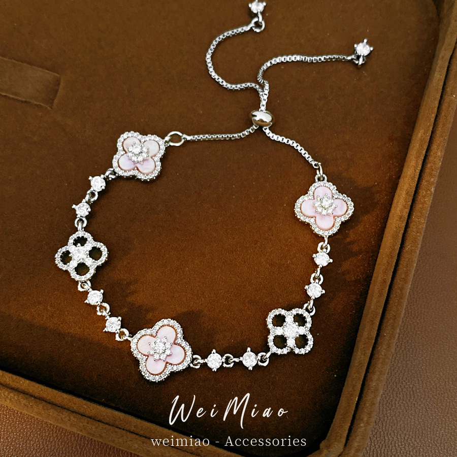Exquisita variedad de diamantes de diamante flor hueco pulsera ligera de lujo pulsera alta sensación de moda moda joyas al por mayor