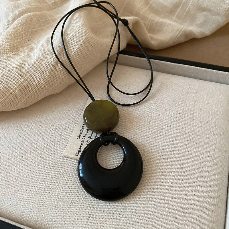 33# necklace-black-green-leather cord-oblate