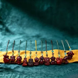 犀牛角紫檀十二生肖摆件钥匙扣手机链木质工艺品挂饰