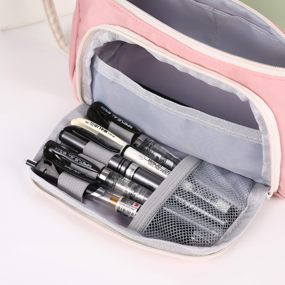 Bolso para lápices con ventana triangular transfronteriza Versión coreana de la caja de papelería de color sólido simple Bolsa de papelería de gran capacidad multifuncional creativa