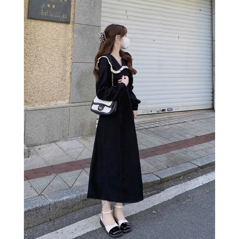 大きいサイズの婦人服の高級感の子供の襟のニットのワンピースの秋の太っているMMは腹を遮ってやせているスカートの気質の小さい黒いスカートを現します。|undefined
