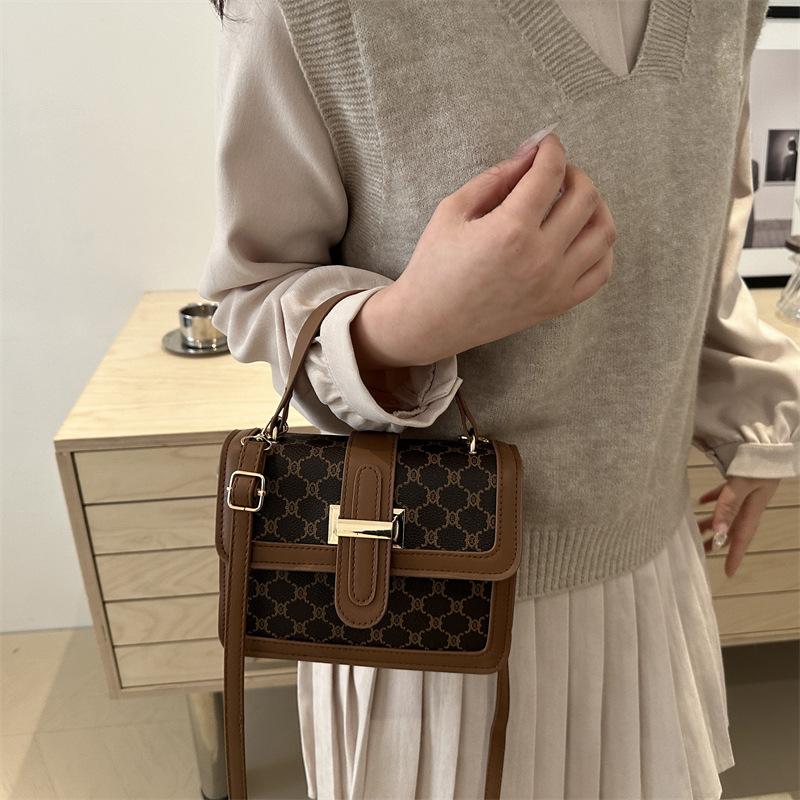 2025 nueva moda simple de alto valor de cara bolso de hombro de moda retrógrada impresión de personalidad bolso de viaje portátil pequeño