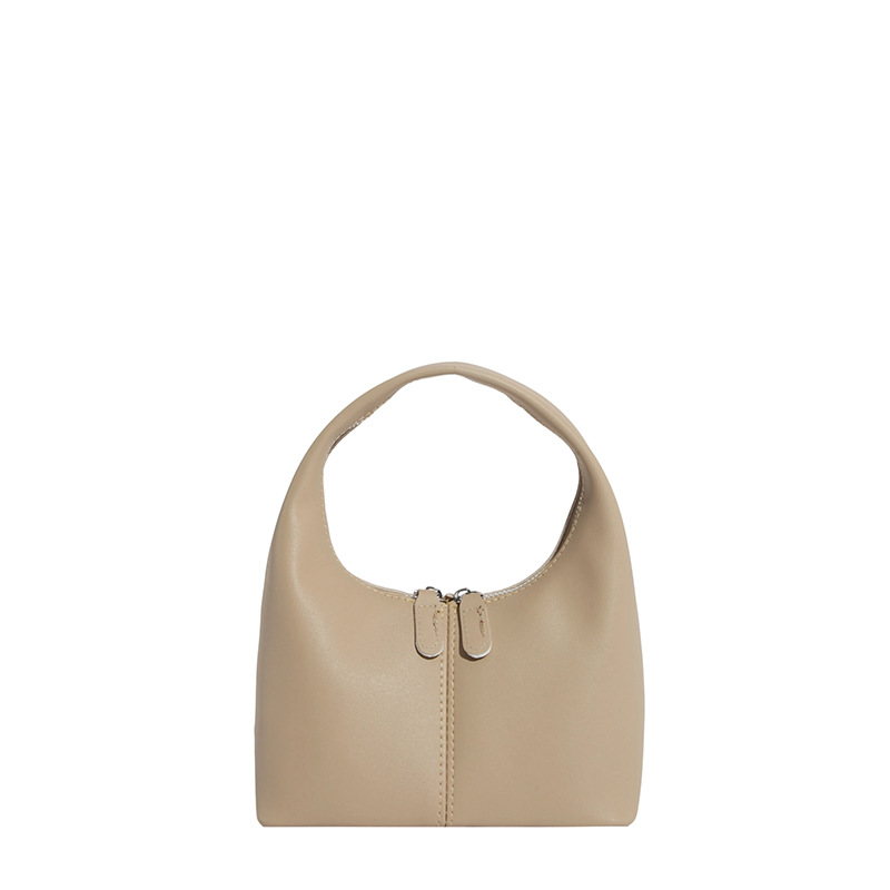 Bolsa de sensación alta 2025 nueva moda ocio versátil bolso de brazo de textura de otoño bolso de bolsillo de mano de dama