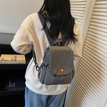 新款帆布双肩包男女休息背包休闲大容量翻盖包学生书包出游-