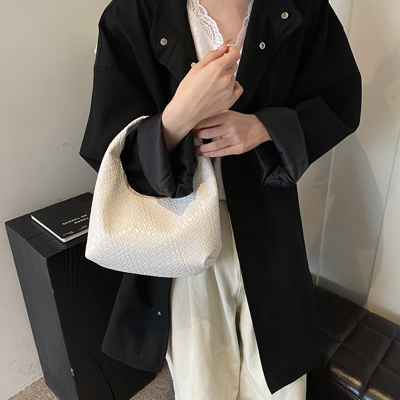 Red retró simple mujer 2024 otoño y invierno nueva moda ocio mochila bolsa trenzada bolso de hombro bajo la axila