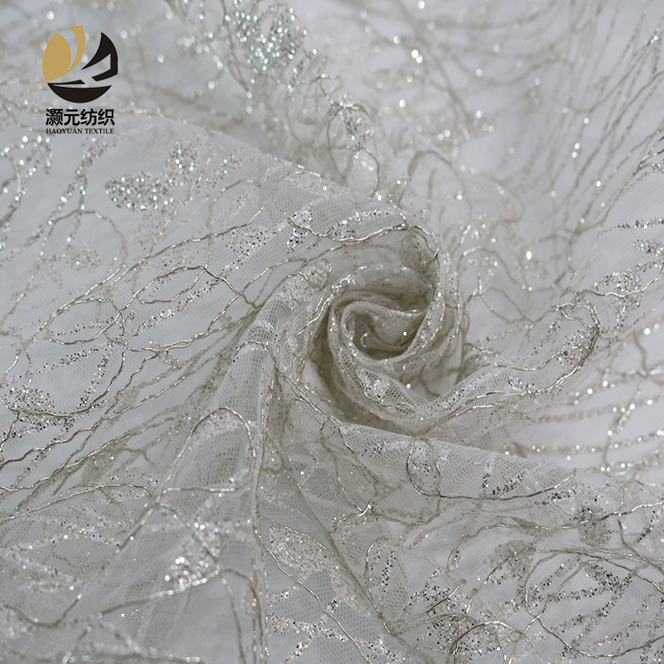 Fabricantes promocionales de bajo precio blanco polvo bordado esquinilla hilo de encaje de plata pulverizado oro vestido de boda tela