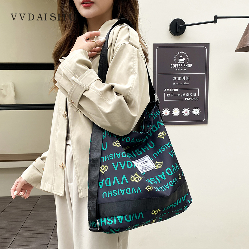 2023 Fashion Large Capacity Shoulder Women's New Oxford Cloth Backpack for Commuting Versatile Crossbody Mommy Bag_voghion.com