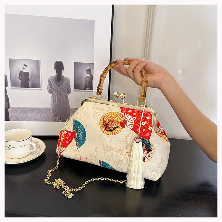 2023 neue grenzüberschreitende Nischenclip-Schnalle, High-End-Dinner im ethnischen Stil, Modekette, eine Schulter, Umhängetasche für Damen_voghion.com