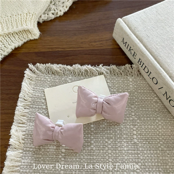 Fuchsia footwear buckle with bow