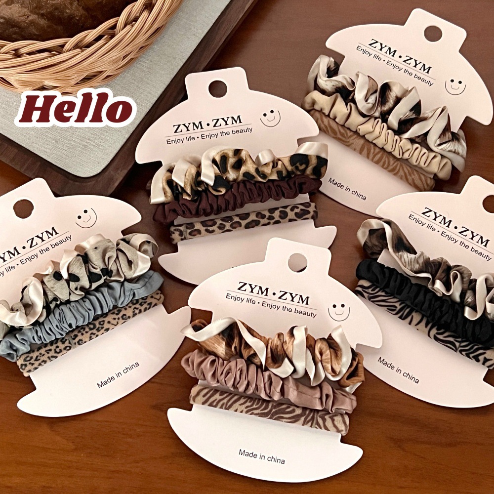 Japón y Corea del Sur de alto valor de toalla de estampado de leopardo 3 piezas conjunto de temperamento de niña simple atado cuerdas para el cabello adornamiento