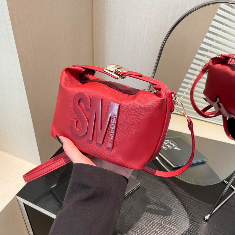 Bolso de hombro 2025 primavera nueva bolsa de cámara ancha correa de hombro letras bolso de moda simple mochila de estilo extranjero mujer