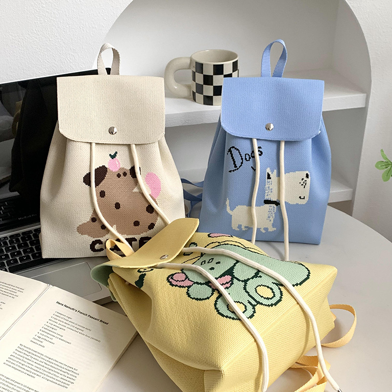 Mochila de alta calidad para damas nueva personalidad de dibujos animados versátil de gran capacidad de viaje bolsa de tejido portátil mochila de punto