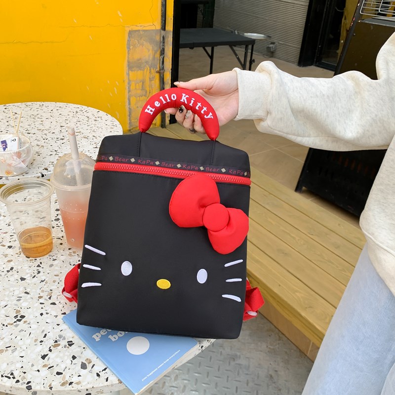 超火卡通蝴蝶结猫咪包包日系新款流行黑色手提双肩包时尚便携背包